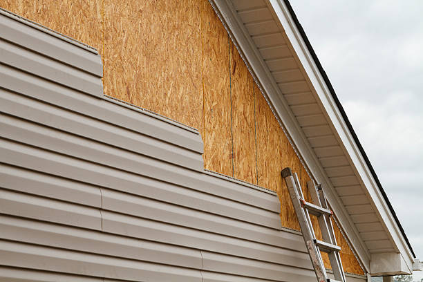 Professional Siding Installation technician working in Melrose Park, NY